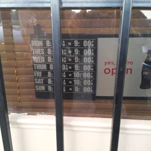 The store hours.  There are bars on the door in case you get so hungry you want to break in.