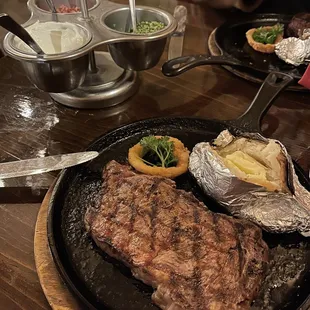 Steak, potato, and toppings. Where do you see toppings served like this anymore? Where do you see parsley as a garnish anymore?