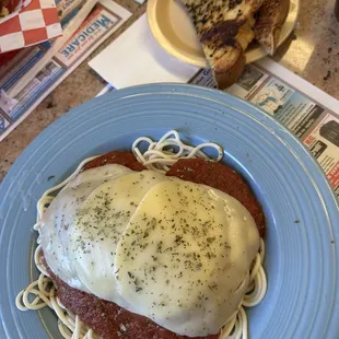 Chicken Parmigiana Over Spaghetti - huge portion. And this is supposed to be the "senior" portion.