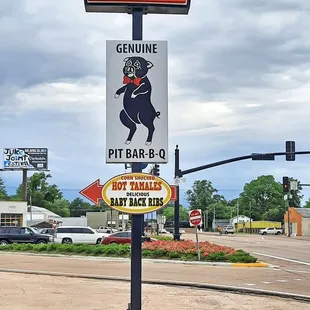 ows a sign for a bar - b - q