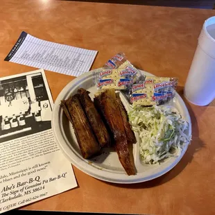 Three tamales with coleslaw