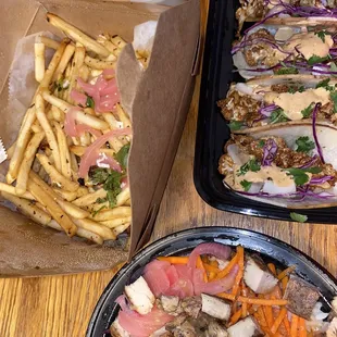 Cauliflower tacos,  fries and chicken bowl