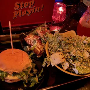 Private Island Cheeseburger, elote egg roll and Abe&apos;s House Salad