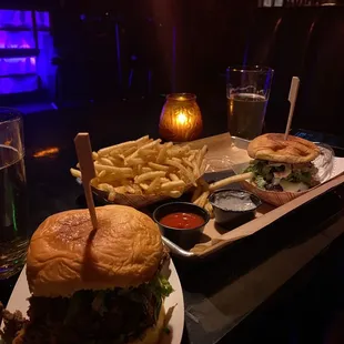Private Island Cheeseburger (right) and Hot Dipped Fried Chicken Sandwich (left)