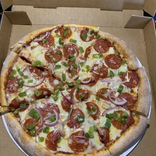 Large thick crust pizza with pepperoni, onion, and bell pepper