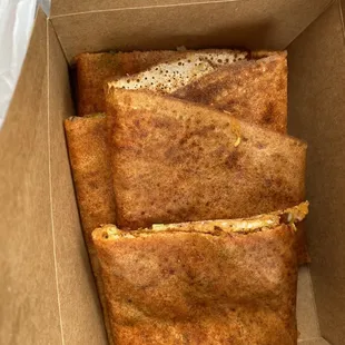Spring dosa with carrot and peas and cheese. Togo only parts still crispy. Hard for 1 person to finish. Spinach chutney delicious.