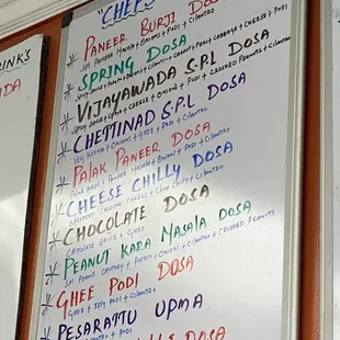 Dosa menu with composition of filling. Cheese is new to me. Very filling and delicious. Like a quesadilla but better. Undiscovered