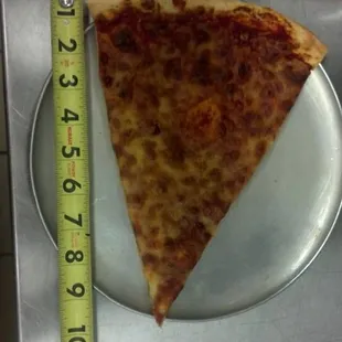 a slice of pizza on a plate