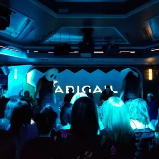 a group of people dancing at a party