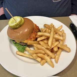 Charm City Burger - crab dip topped burger with fries.