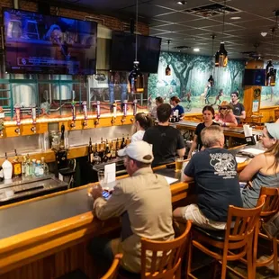 people sitting at the bar