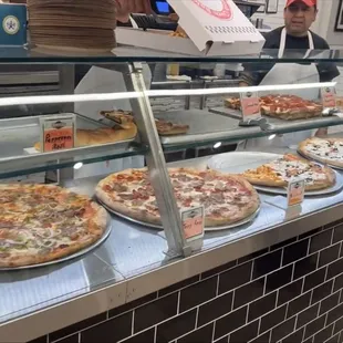 Pure deliciousness... Combo pizza , pepperoni, margarita, chicken, buffalo pizza and the white pizza..