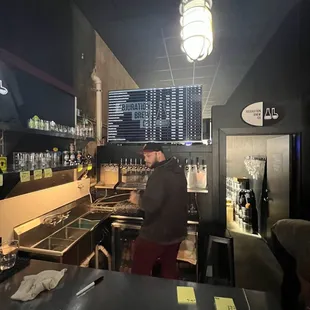 a man working in a bar