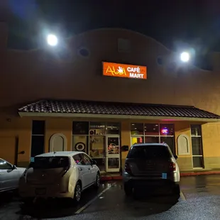 Outside. Storefront. Entrance. Located on the back side of Plaza Fiesta facing Clairmont Road near an outdoor Bank of America ATM.