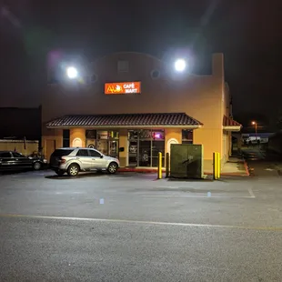 Outside. Storefront. Entrance. Located on the back side of Plaza Fiesta facing Clairmont Road near an outdoor Bank of America ATM.