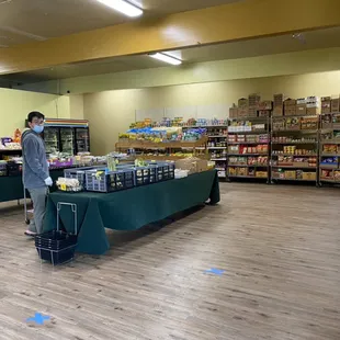 a man standing in a grocery store