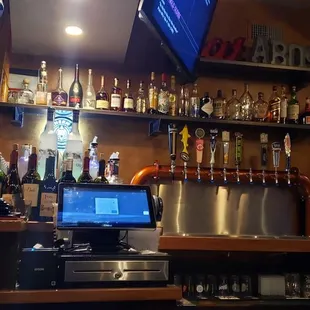 a bar with a lot of bottles