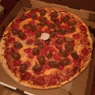 Pizza with sausage and pepperoni
