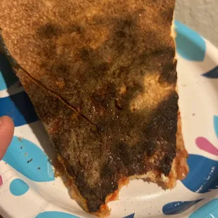 Burned pizza that taste like smoke. Awful