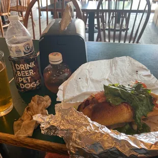 a beer and a sandwich