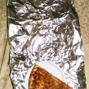 40 feet of aluminum foil for a poor little slice of pizza, ain't good for nothin'!