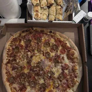 18" meat lovers pizza and Garlic Cheese Roll.