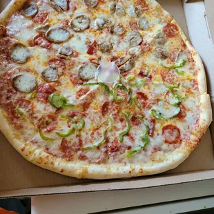Pepperoni, half green pepper, half sausage, and 2x extra cheese