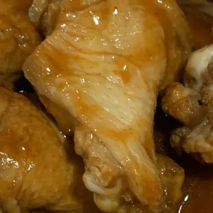 Raw. The only color is from the sauce. Inside was pink.