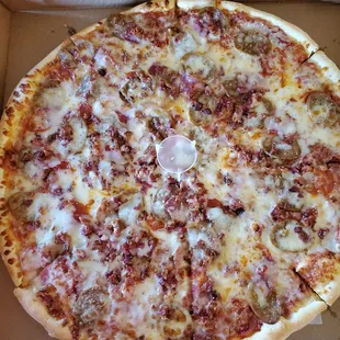 Lg pie with Pepperoni, sausage, Canadian bacon, bacon, beef and extra cheese $28