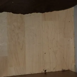 Side of bed and nightstand