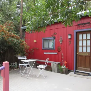Little Red House Studio with private patio in back.