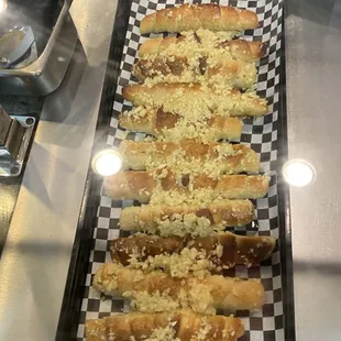 -pepperoni rolls slathered in butter and raw garlic. OMG so good