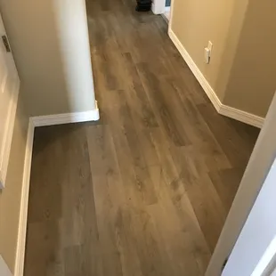 a hallway with hardwood floors