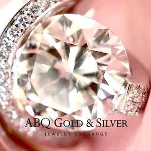 Pretty in Pink! This GIA certified 2.28 ct. round brilliant will have your bride-to-be blushing, "Yes!"