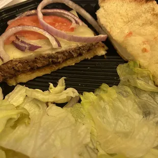 Nasty iceberg lettuce, tomatoes and onion instead of hatch green chile, and a thick patty instead of two smash patties as advertised.