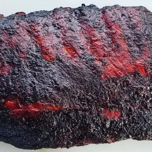 We're selling pork spare ribs now!  NM Red Chile is added to our KC BBQ Sauce on these bad boys, smoked for 6 hours.