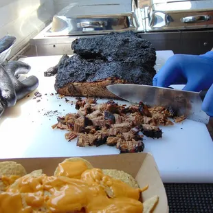 Chopping some brisket for an order of Sloppy-Chos.