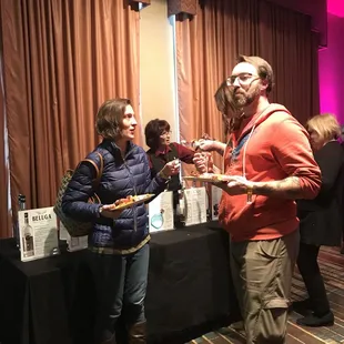 People tasting the food