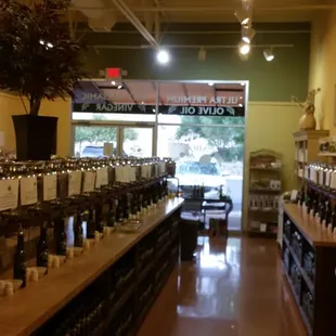 rows of olive oil bottles