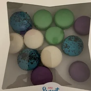 12 macarons, 3 each of cookies 'n cream, matcha, chantilly, lavender