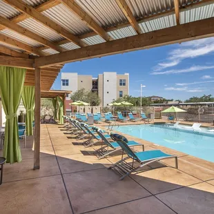 Resort-style pool with sun shelf