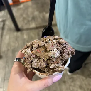 Chocolate ice cream base with Reese&apos;s and rainbow sprinkles