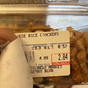 Expired food covered up with a new sticker. What&apos;s a trash ass establishment