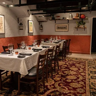 a dining room with tables and chairs