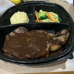 Grilled ribeye with Yukon Gold mashed potatoes and steamed vegetables.