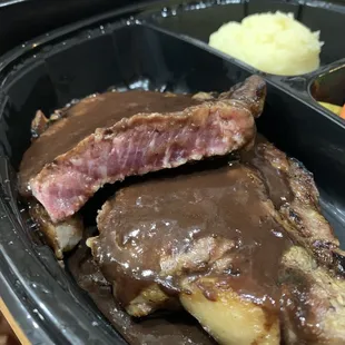 Same grilled ribeye, ordered medium rare, and this is definitely not medium rare.