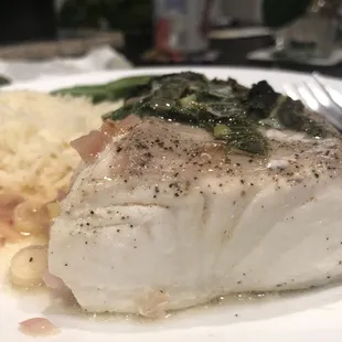 Wild caught Alaskan halibut - poached in thai lemon mint sauce. Sooo tender and flaky