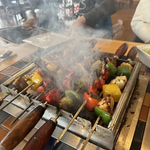 smoke coming out of the grill