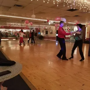 Dancers on the floor.