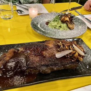 Smoked new york steak, wild mushroom, pickled allium, black garlic cream